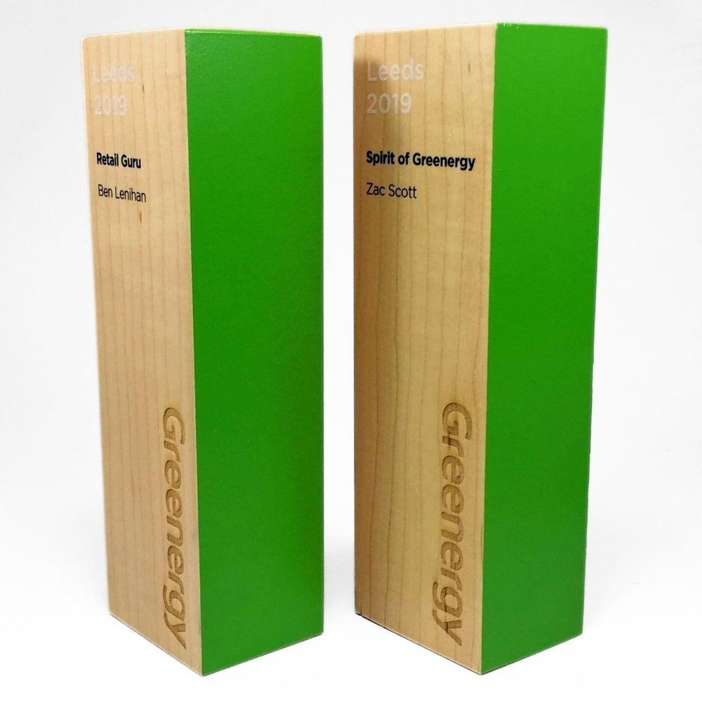 green and wooden award with Greenergy written on the side