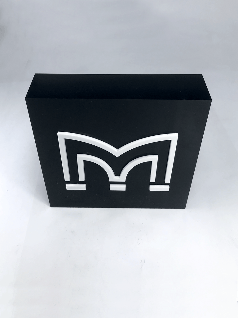 White Perspex M on Black Acrylic Award Creative Awards London Limited